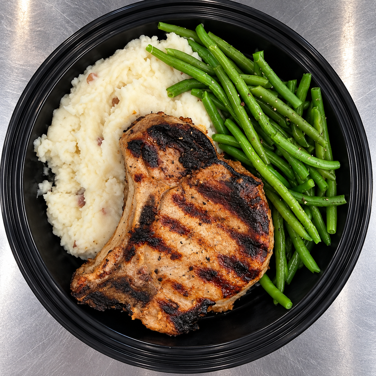 42 Pork Chop / Mashed Potatoes/ Green Beans